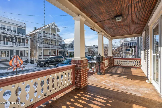 a view of livingroom with window ceiling fan and hardwood floor