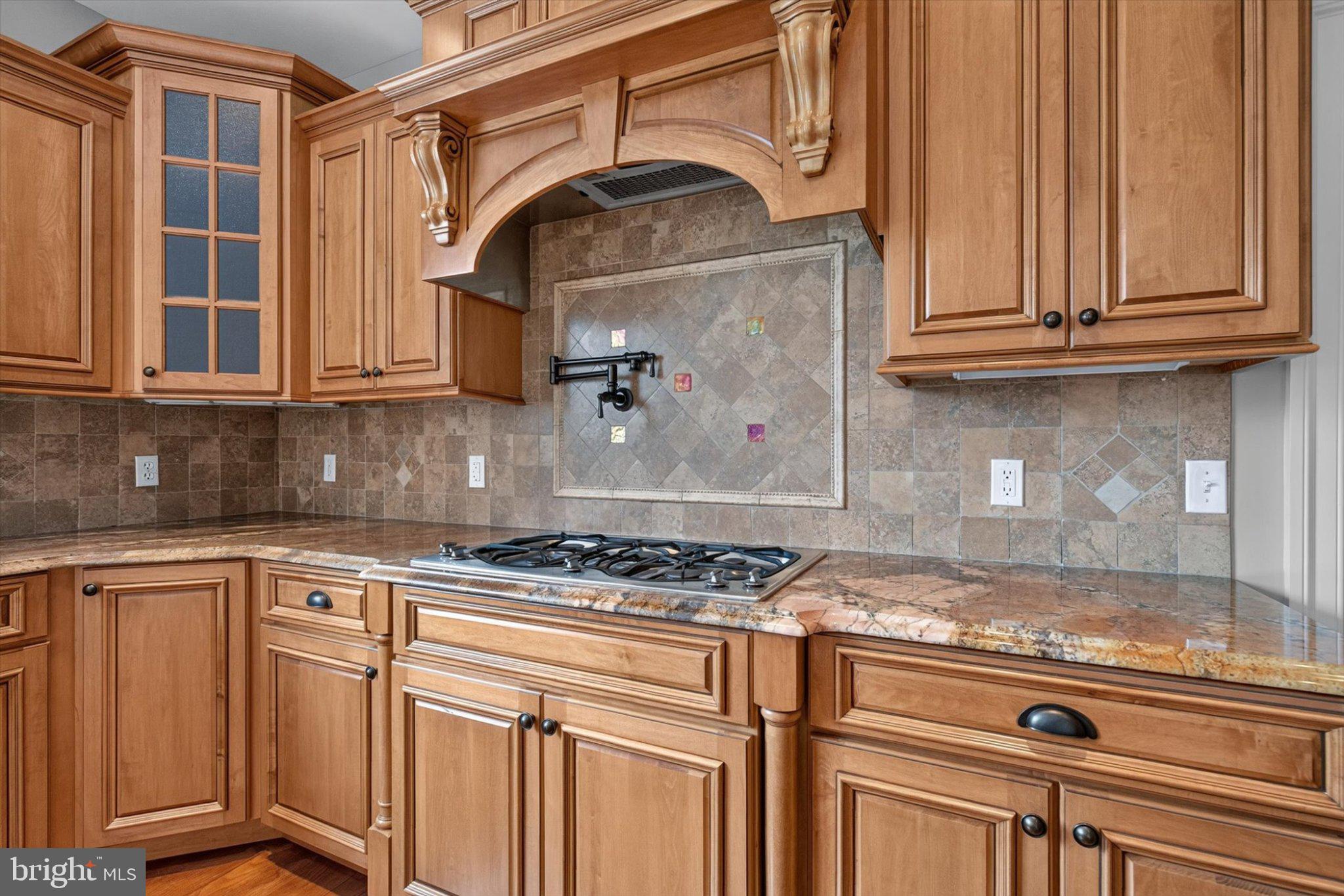 6505 Plowman Ridge Harrisburg, PA 17112 - Photo 22 of 83 Warm wood tones in a stylish kitchen.