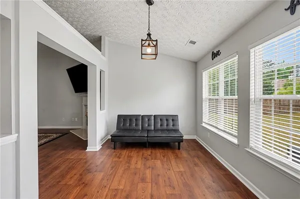 a view of entryway with wooden floor