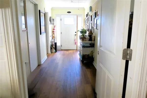 a bathroom with a toilet sink and shower