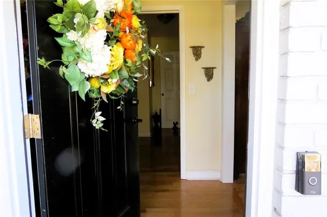 a bathroom with a sink a mirror and a shower