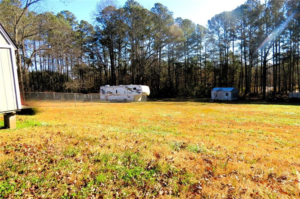 4880 Pea Ridge Road Cornelia, GA 30531 - Photo 28 of 34 a view of swimming pool with an outdoor space and seating area