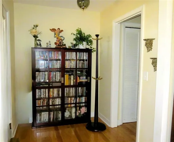 a kitchen with granite countertop stainless steel appliances and wooden cabinets