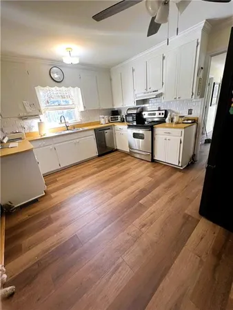 a view of a dining room with furniture