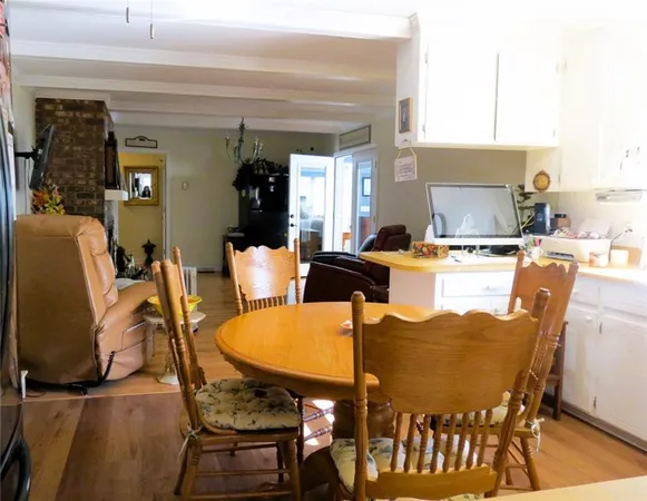 a kitchen with a sink appliances and cabinets