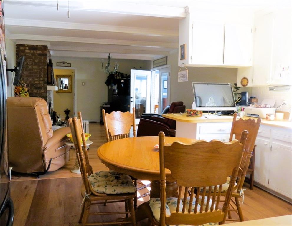 4880 Pea Ridge Road Cornelia, GA 30531 - Photo 9 of 34 a view of a dining room with furniture