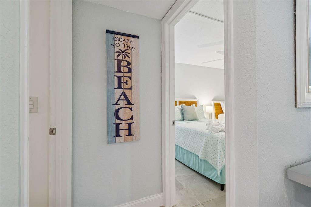 14600 Gulf Boulevard, Unit 102 Madeira Beach, FL 33708 - Photo 19 of 46 a en suite bathroom with a sink and a toilet