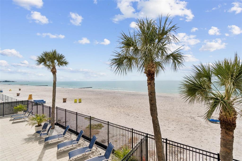 14600 Gulf Boulevard, Unit 102 Madeira Beach, FL 33708 - Photo 27 of 46 a view of ocean with palm trees