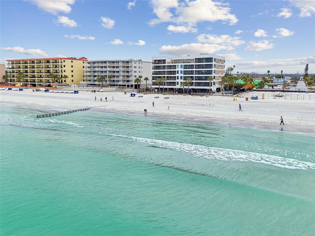 14600 Gulf Boulevard, Unit 102 Madeira Beach, FL 33708 - Photo 40 of 46 a view of a swimming pool and an outdoor space
