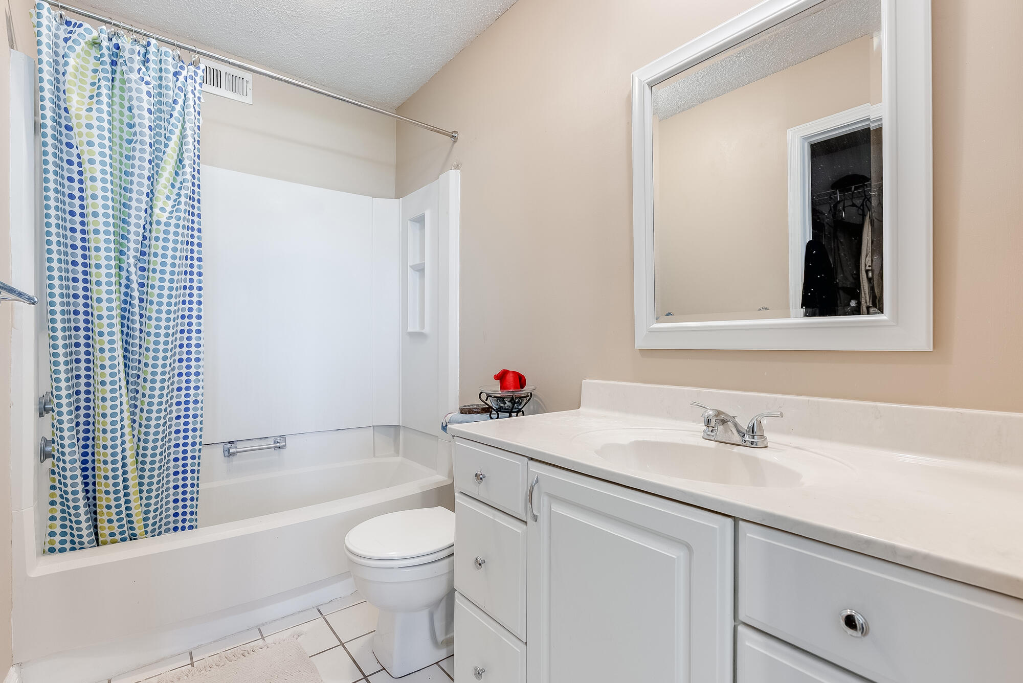 200 Pensacola Beach Road, Unit D2 Gulf Breeze, FL 32561 - Photo 18 of 38 a bathroom with a sink toilet and shower