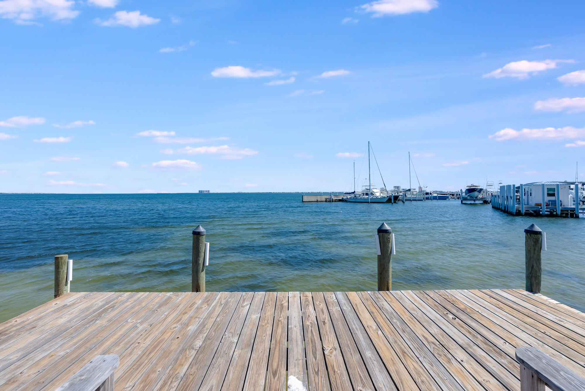 200 Pensacola Beach Road, Unit D2 Gulf Breeze, FL 32561 - Photo 26 of 38 a view of a lake with outdoor seating