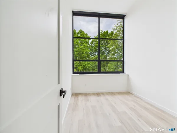 a view of a window in an empty room