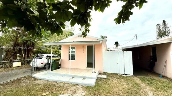 a view of a house with a patio