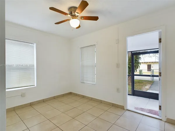 a view of an empty room and window