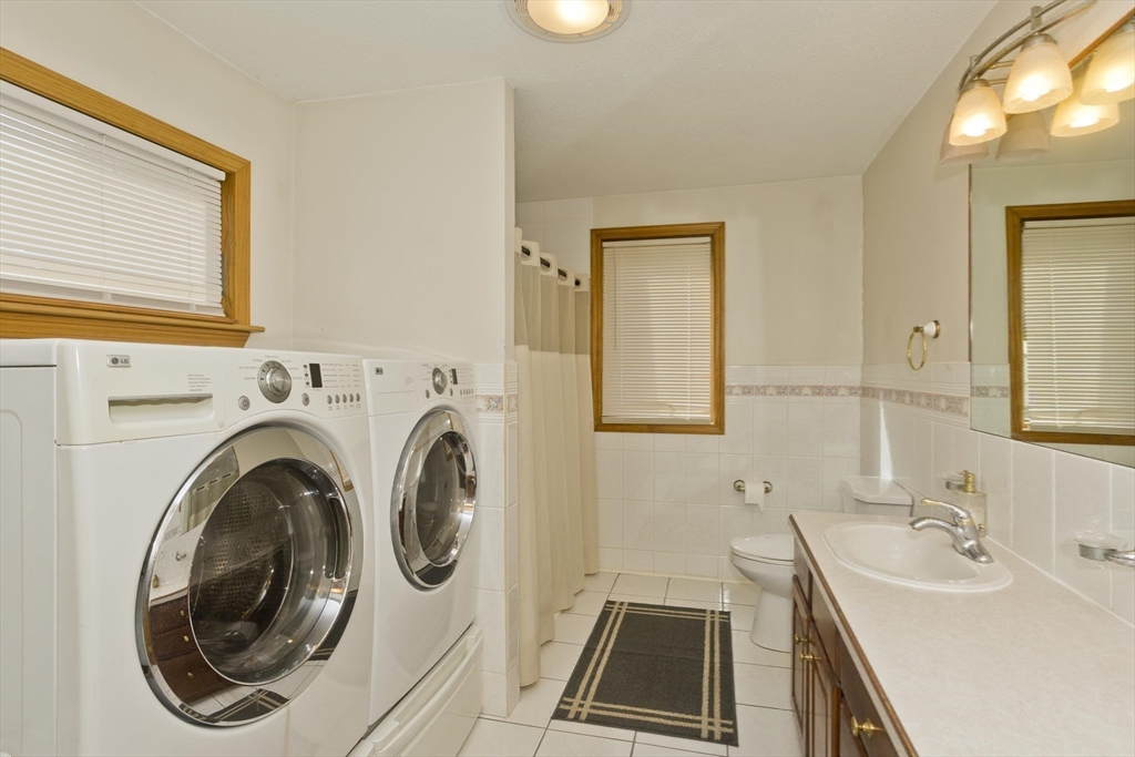 65 Verdugo Street West Springfield, MA 01089 - Photo 14 of 40 a bathroom with a sink and a mirror