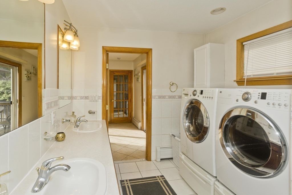 65 Verdugo Street West Springfield, MA 01089 - Photo 16 of 40 a en suite bathroom with a sink mirror vanity and toilet