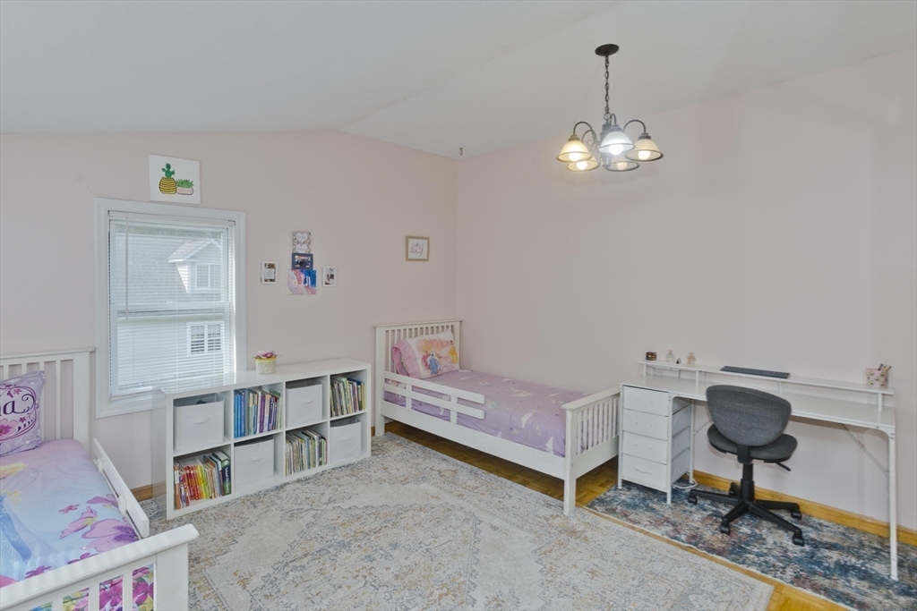 65 Verdugo Street West Springfield, MA 01089 - Photo 18 of 40 a living room with furniture and a dining table