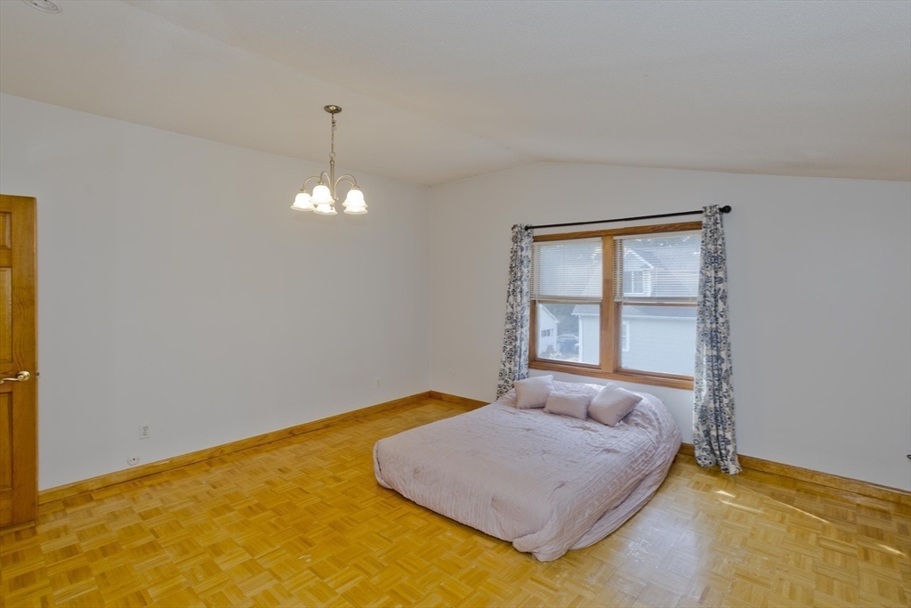 65 Verdugo Street West Springfield, MA 01089 - Photo 22 of 40 a bedroom with a bed and a window