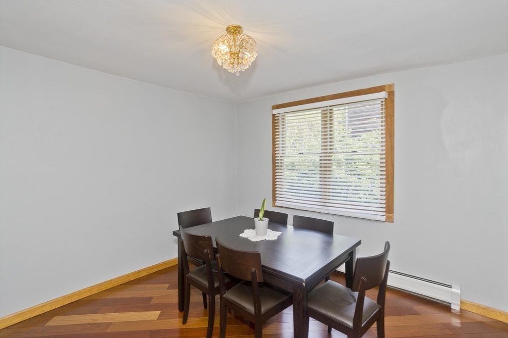 65 Verdugo Street West Springfield, MA 01089 - Photo 26 of 40 a view of a dining room with a table and chairs