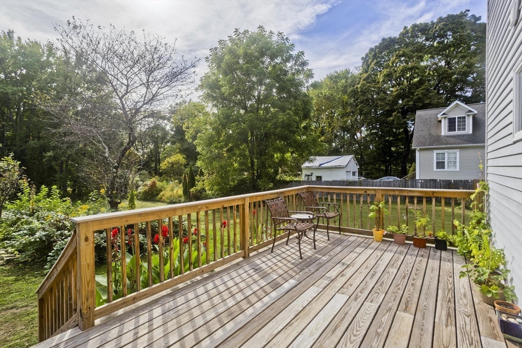 65 Verdugo Street West Springfield, MA 01089 - Photo 32 of 40 a view of balcony with wooden floor and fence
