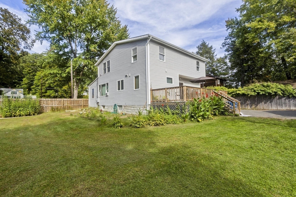 65 Verdugo Street West Springfield, MA 01089 - Photo 36 of 40 a view of a backyard with plants and large trees