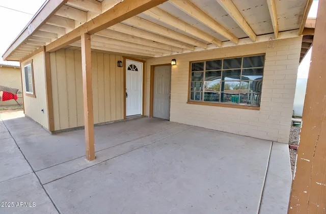a view of a building with a street