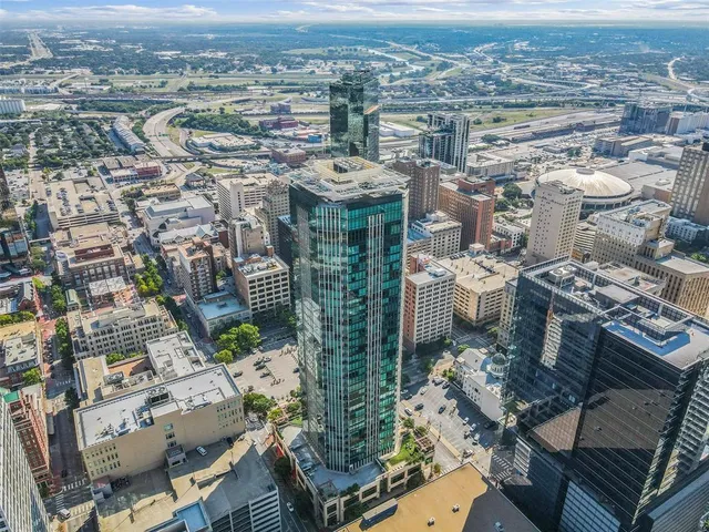 an aerial view of a city with lots of residential buildings