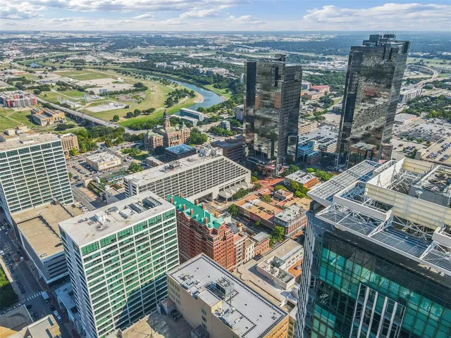 a view of a city with tall buildings
