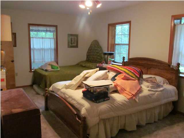 436 Thornton Road DeFuniak Springs, FL 32435 - Photo 12 of 13 a bedroom with a bed and window