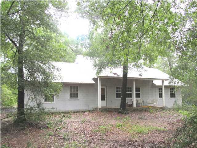 436 Thornton Road DeFuniak Springs, FL 32435 - Photo 3 of 13 front view of a house with a yard