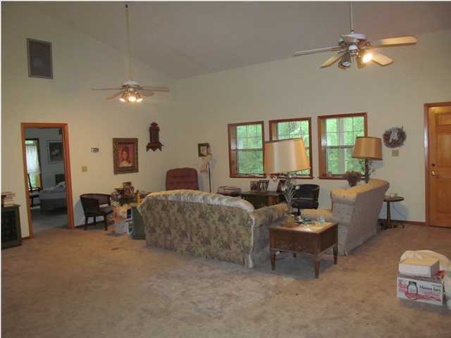 436 Thornton Road DeFuniak Springs, FL 32435 - Photo 5 of 13 a living room with furniture flowerpot and a window