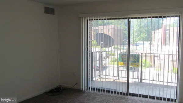 a view of a room that has a window