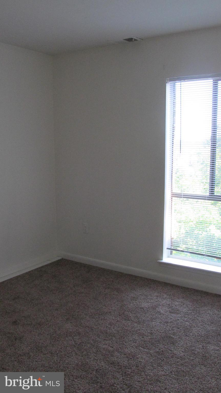 3200 Spartan Road, Unit 3E4 Olney, MD 20832 - Photo 8 of 19 an empty room with a window