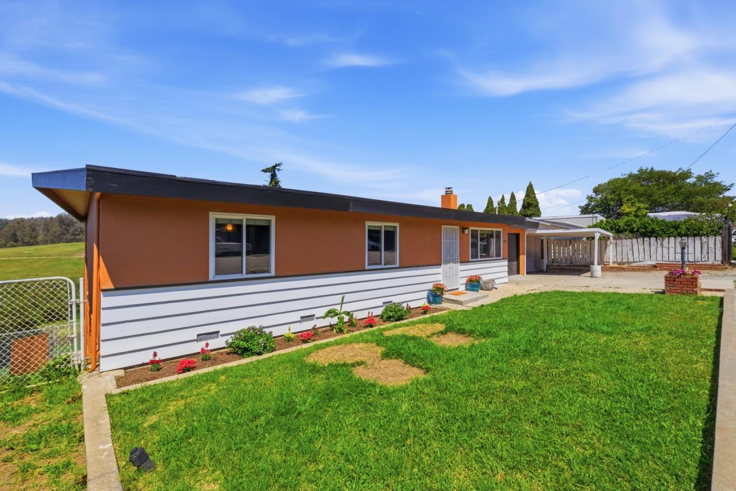 215 Manfre Road Watsonville, CA 95076 - Photo 4 of 36 a front view of house with yard and seating area