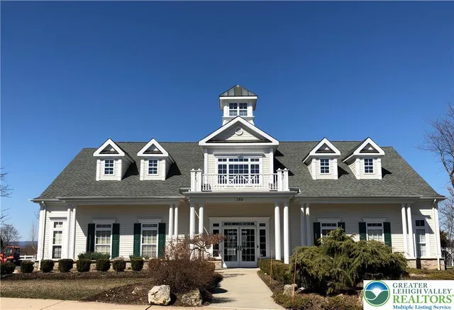 a view of a swimming pool and an outdoor space