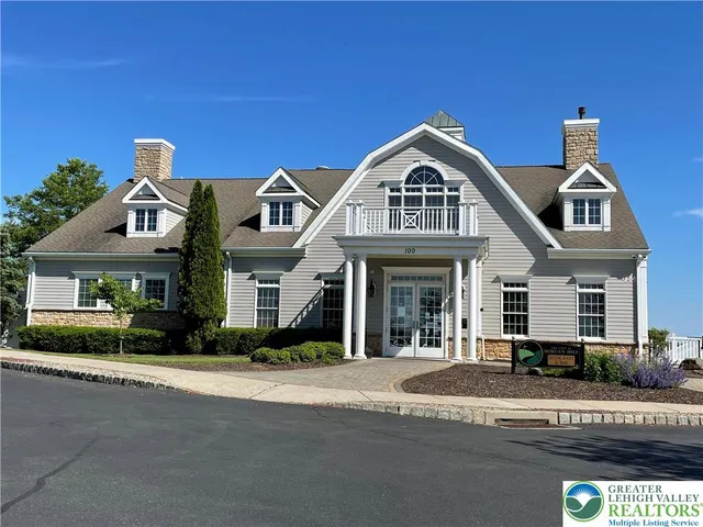 a view of a chairs and table in the patio