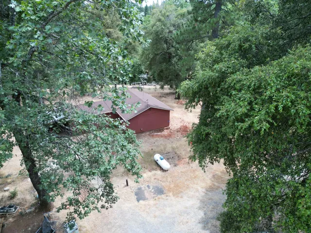a view of backyard with outdoor space