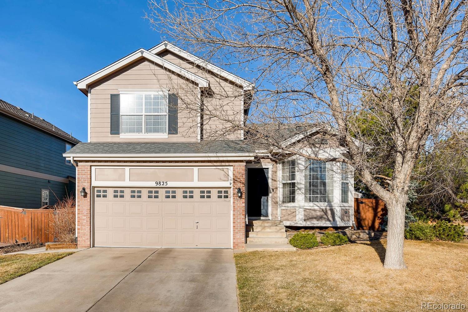 9825 South Thornbury Way Highlands Ranch, CO 80129 - Photo 1 of 27 a view of a house with a outdoor space