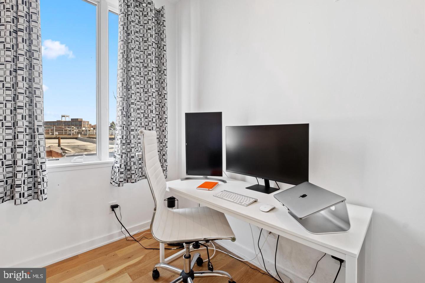 1617-27 Hope Street, Unit 2D Philadelphia, PA 19122 - Photo 27 of 32 a view of a workspace with furniture