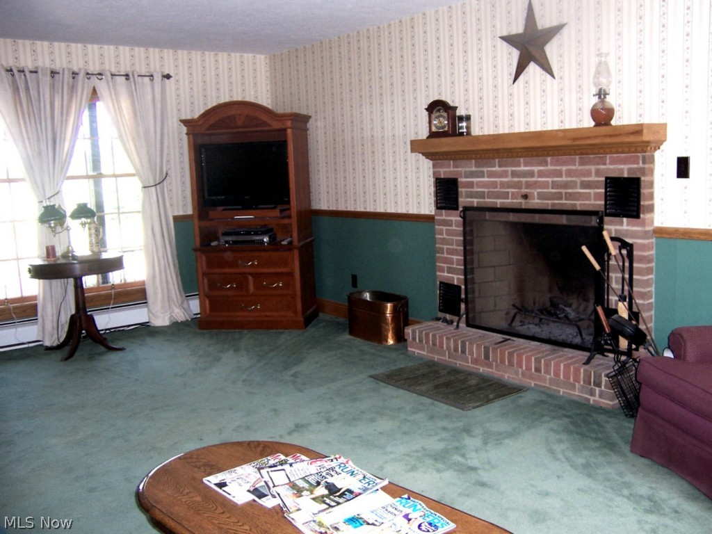 3077 Burns Road Madison, OH 44057 - Photo 13 of 25 Family Room with Fireplace