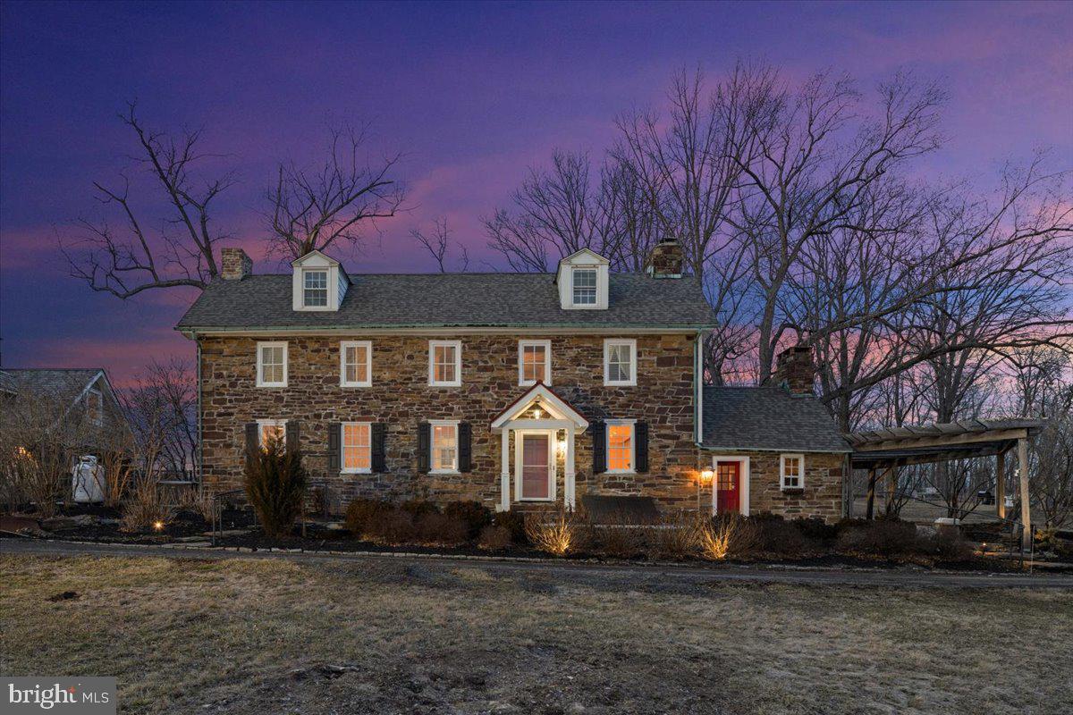 1515 Sugar Bottom Road Furlong, PA 18925 - Photo 20 of 96 a front view of a house with a yard