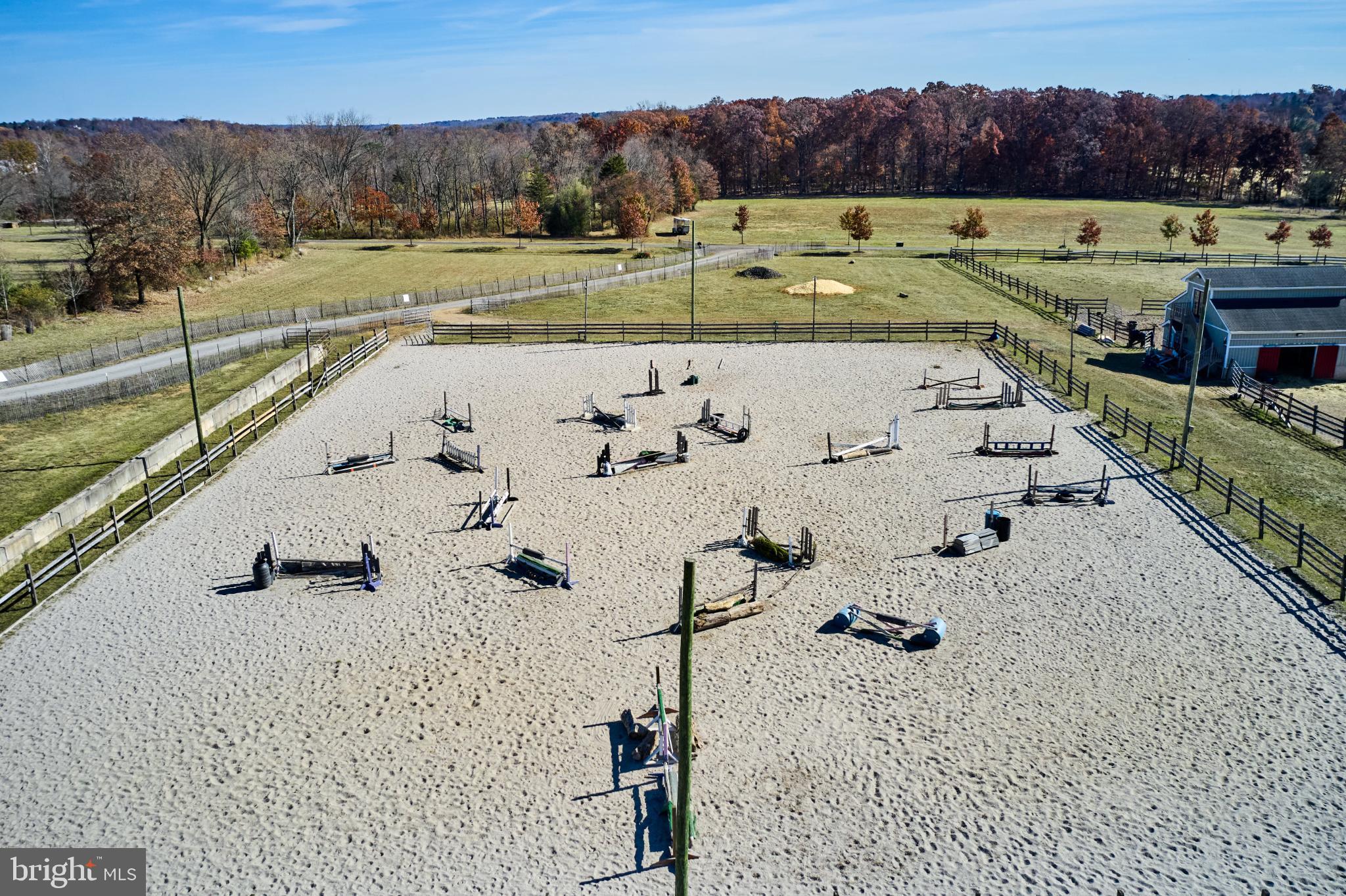 1515 Sugar Bottom Road Furlong, PA 18925 - Photo 23 of 96 Equestrian arena surrounded by nature's beauty.