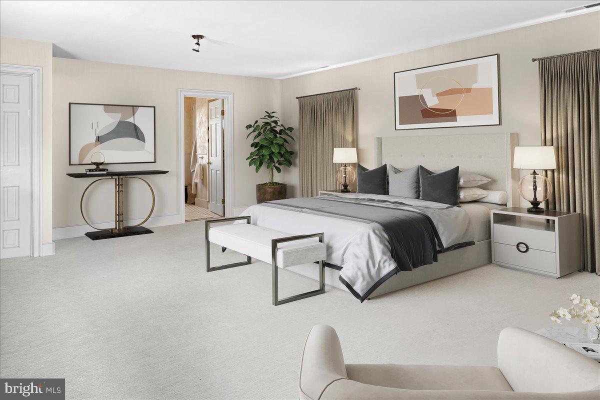 1515 Sugar Bottom Road Furlong, PA 18925 - Photo 43 of 96 a bedroom with a bed a couch and potted plant with view of bedroom