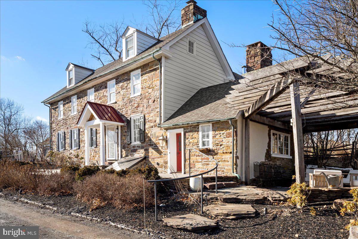 1515 Sugar Bottom Road Furlong, PA 18925 - Photo 88 of 96 a front view of a house with garden