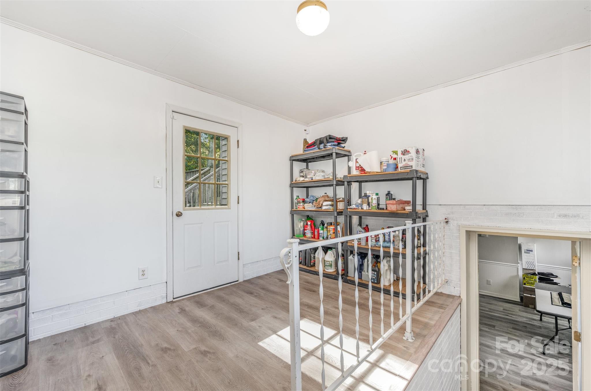1500 Beth Haven Church Road Denver, NC 28037 - Photo 24 of 35 a view of a livingroom with shelves