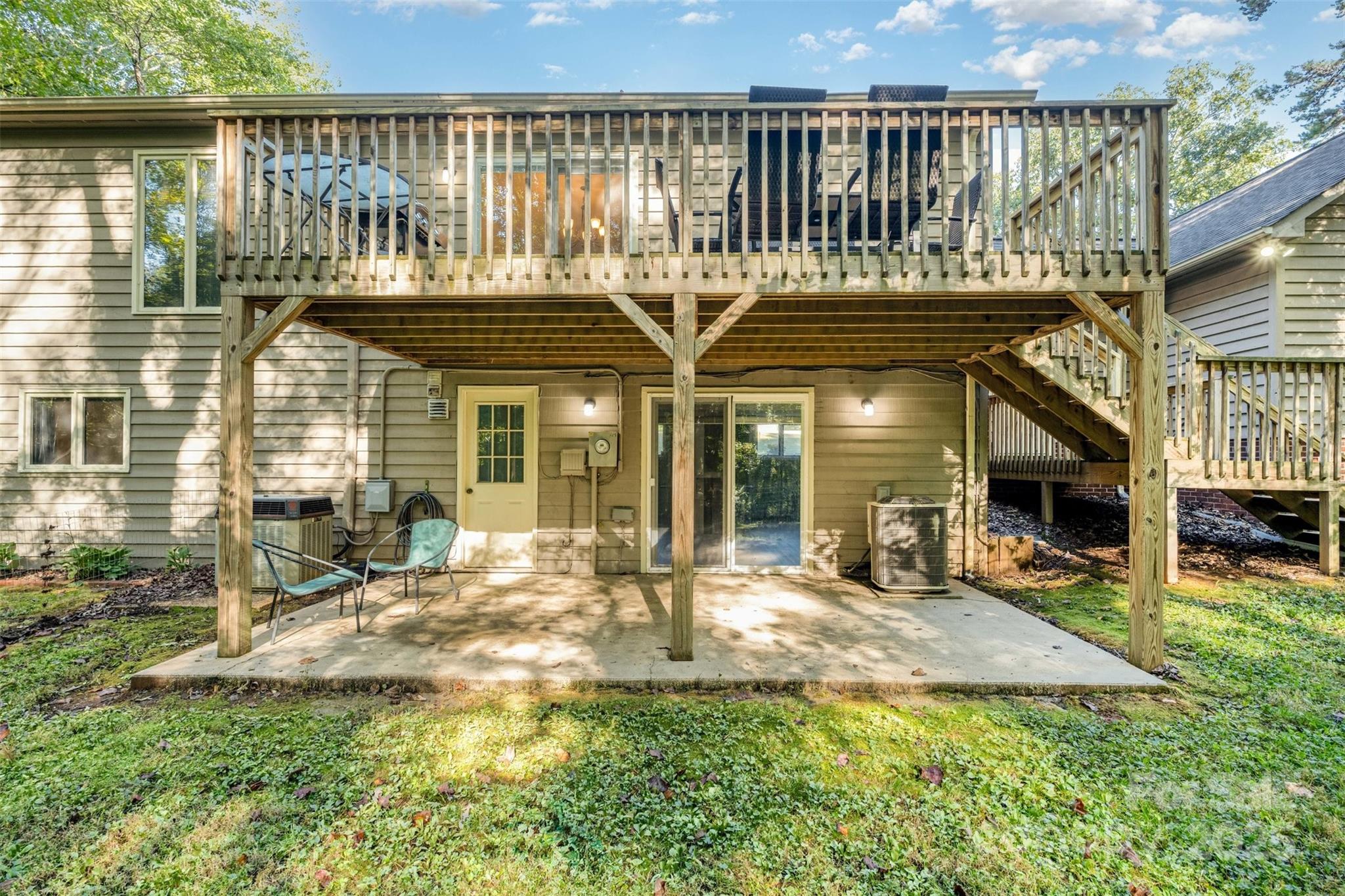 1500 Beth Haven Church Road Denver, NC 28037 - Photo 28 of 35 a view of a house with backyard porch and sitting area