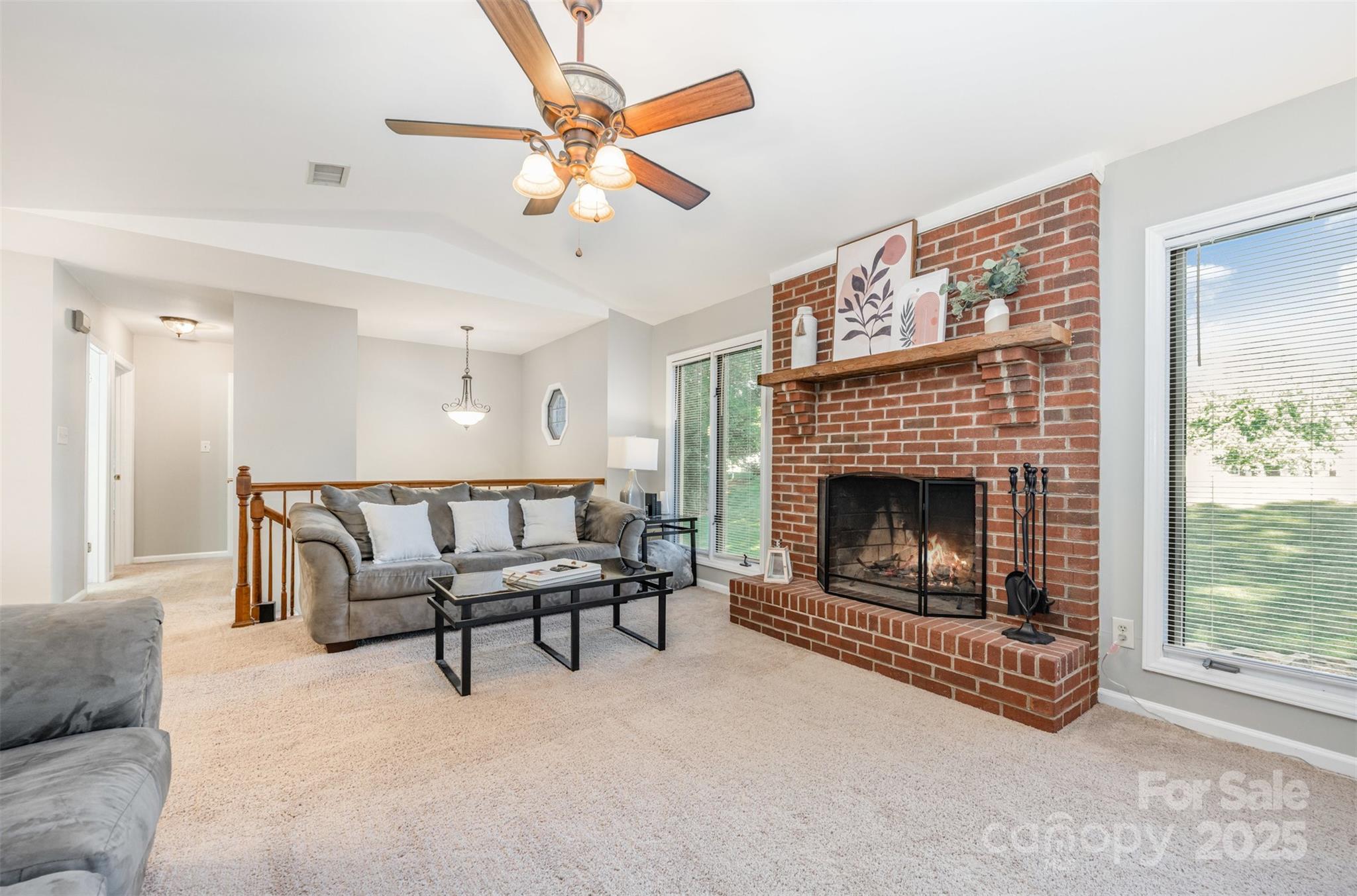 1500 Beth Haven Church Road Denver, NC 28037 - Photo 5 of 35 a living room with furniture and a fireplace