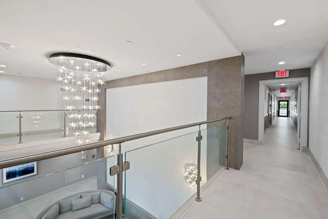 a view of a hallway with elevator