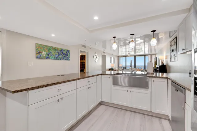 a bedroom with a bed and a view of bathroom