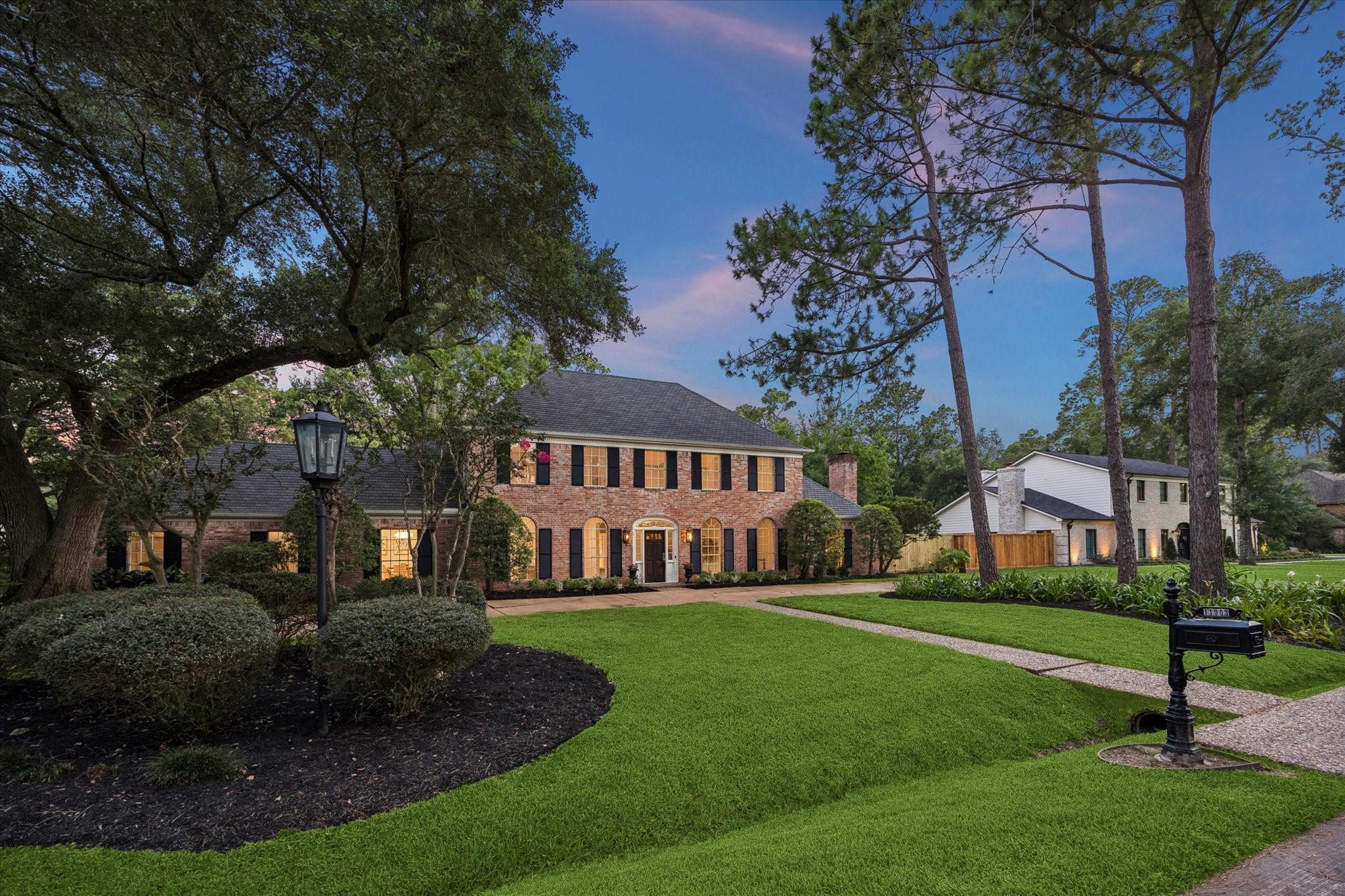 11903 Stoney Ridge Lane Houston, TX 77024 - Photo 2 of 44 Situated on a large 20,160 SF wooded lot with a circular drive and 3-car garage. Please note that roof was recently replaced in 2023.